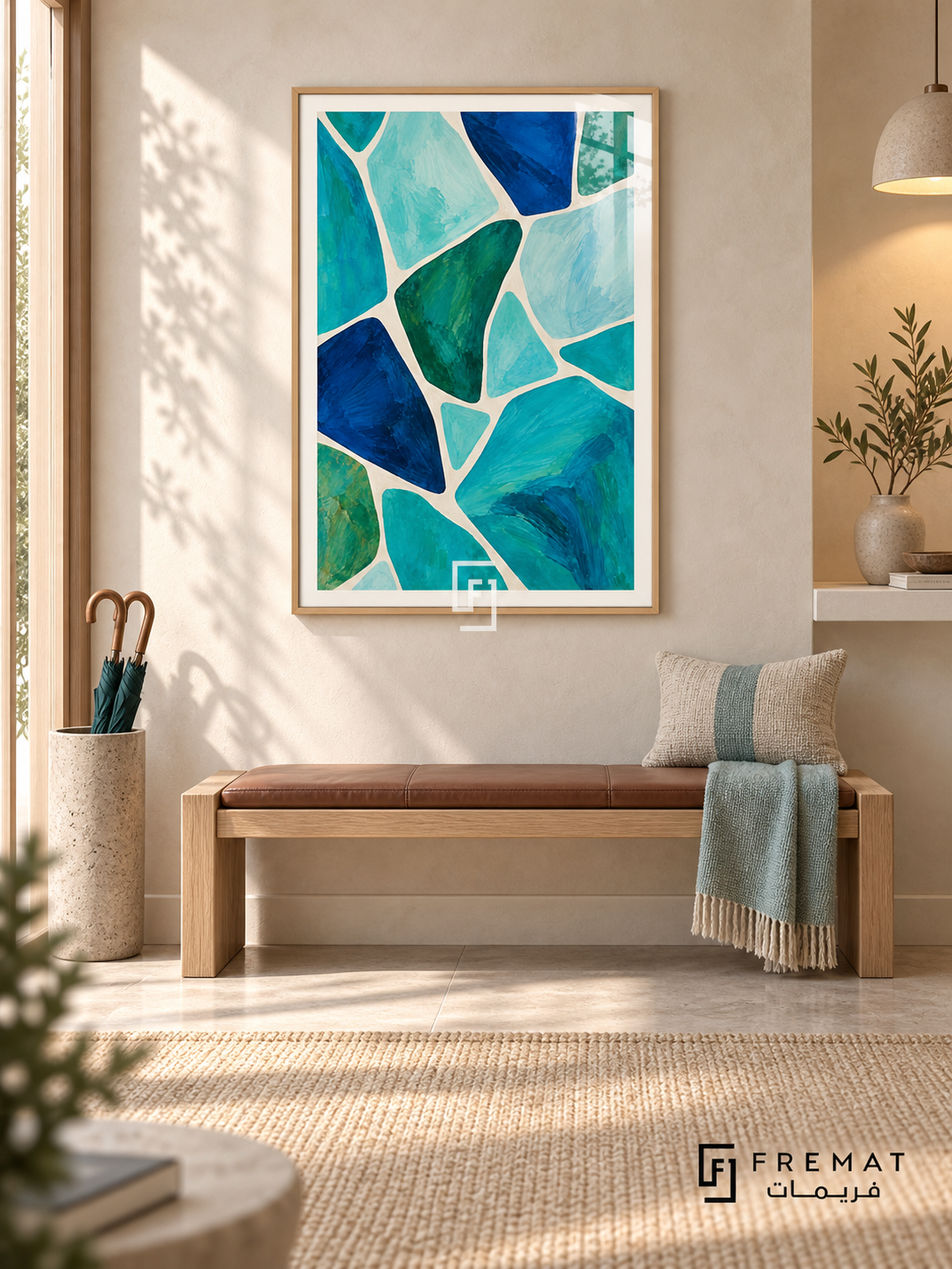 Lagoon Mosaic: Irregular turquoise, aqua, cobalt and deep green shapes form a painterly mosaic separated by flowing ivory channels. Wooden Texture PVC frame displayed with an oak entry bench with a leather cushion and teal throw.
