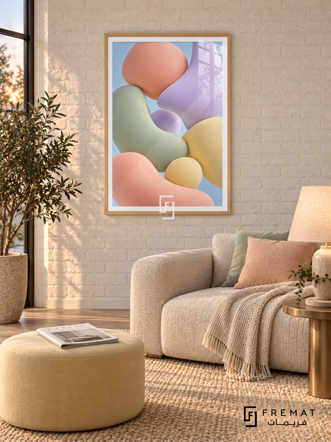 Pastel Drift: Softly shaded pebble-like forms in peach, sage, lilac and pale yellow float together against a light blue background. Wooden Texture PVC frame displayed with a cream sofa and round yellow ottoman.