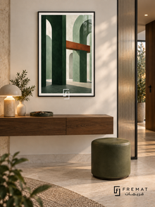 Sage Passage: Forest-green columns and sage arches form an imagined architectural space, crossed by a rust beam and soft geometric shadows. Black PVC frame displayed with a floating walnut console and olive leather stool.