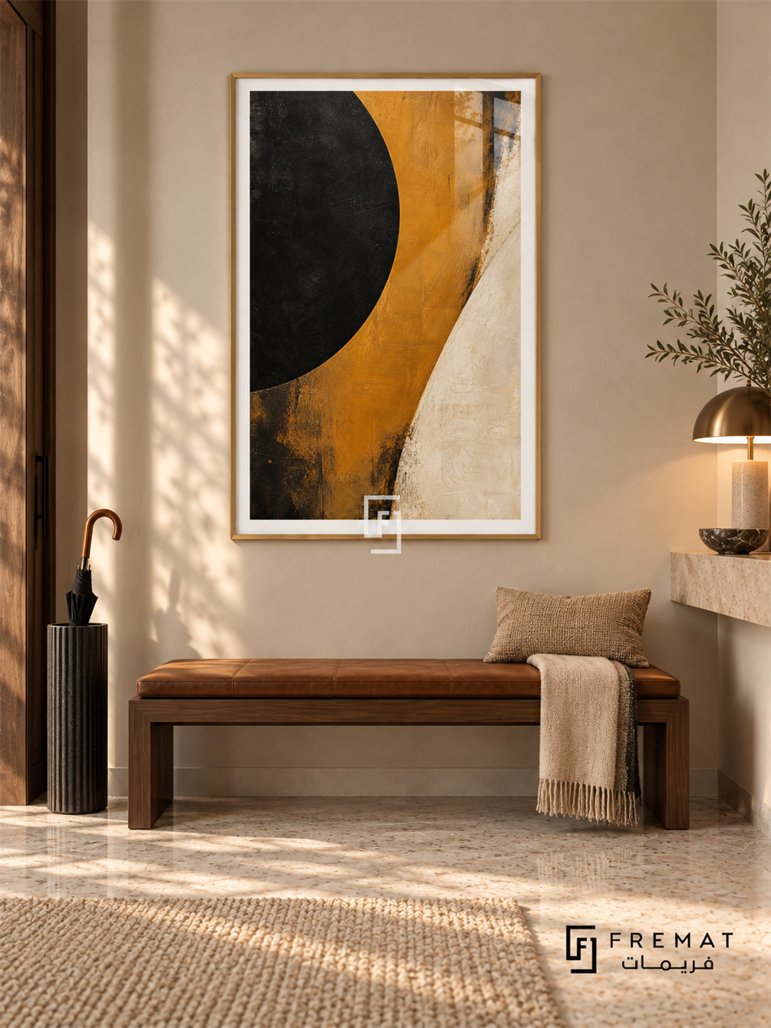 Ochre Eclipse: A large cropped black disc meets a sweeping ochre band and an ivory field, with weathered painterly textures and dark scuffed edges. Gold PVC frame displayed with a walnut entry bench with a leather cushion.