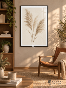 Pampas Whisper. Three delicate beige pampas plumes stand against a warm ivory background. Shown in a Black PVC frame in a styled room.