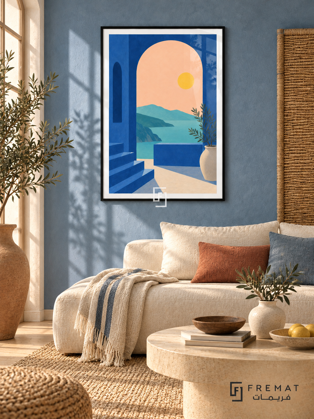 Blue Arch View. A cobalt arch and steps frame turquoise water, distant hills and a yellow sun, with a potted leafy branch. Shown in a Black PVC frame in a styled room.