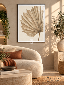 Fan Palm. A close-up beige fan palm spreads its fine diagonal veins across warm ivory. Shown in a Black PVC frame in a styled room.