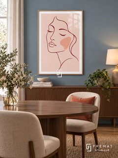 Blush Portrait. A burgundy line drawing of a face with closed eyes and a peach cheek rests on blush pink. Shown in a Wooden Texture PVC frame in a styled room.