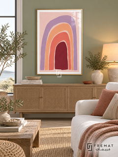 Pastel Rhythm. Uneven nested arches in lavender, peach, coral and burgundy create a warm rainbow-like rhythm on pink. Shown in a Gold PVC frame in a styled room.