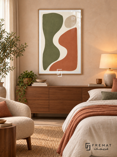 Cut Paper Dialogue. Olive-green and terracotta organic shapes face one another across an ivory curve beneath a sand-colored oval. Shown in a Wooden Texture PVC frame in a styled room.