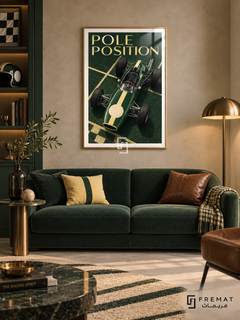 Pole Position (car07), Gold frame with white printed border in a styled interior. A green vintage open-wheel racing car with a pale yellow center stripe is viewed from above on a green starting grid. Pale gold serif lettering reads POLE POSITION.