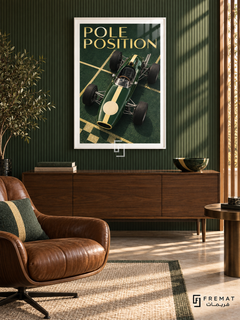 Pole Position (car07), White frame with white printed border in a styled interior. A green vintage open-wheel racing car with a pale yellow center stripe is viewed from above on a green starting grid. Pale gold serif lettering reads POLE POSITION.
