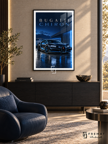 Bugatti Chiron Blue (car12), Black frame with white printed border in a styled interior. A blue-and-black Bugatti Chiron is shown beside modern architecture at night, reflected on wet paving. Spaced lettering reads BUGATTI CHIRON above blue lighting and distant mountains.