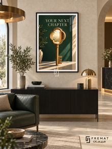 Your Next Chapter (com19), Black frame with white printed border in a styled interior. An oversized gold key contains an open doorway and a sunlit landscape in its ornamental head. Cream “YOUR NEXT CHAPTER” lettering appears on deep green in a surreal interior scene.