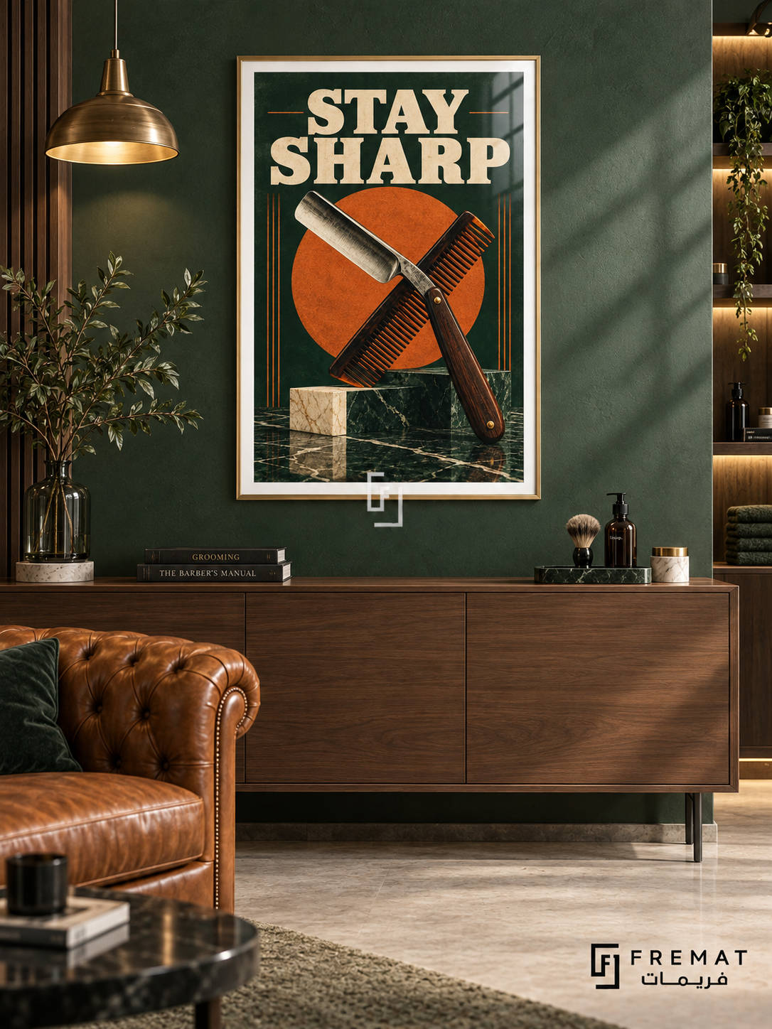 Stay Sharp (com25), Gold frame with white printed border in a styled interior. An open straight razor crosses a comb over an orange disc, forest green and marble-like blocks. Bold cream “STAY SHARP” lettering gives the illustration a distressed vintage-poster treatment.