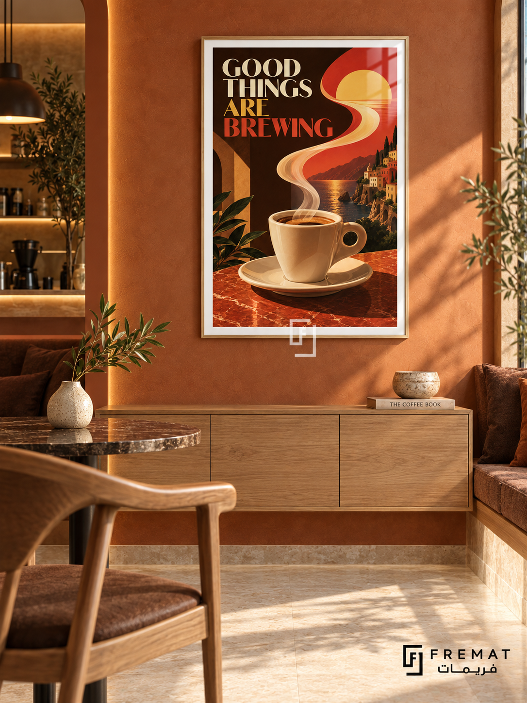 Good Things Are Brewing (com27), Wooden Texture frame with white printed border in a styled interior. Steam rises from a cream coffee cup into a winding sunset above a hillside town and water. Cream and red “GOOD THINGS ARE BREWING” lettering contrasts with warm orange and dark brown.