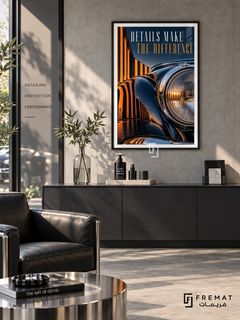 Details Make the Difference (com30), Black frame with white printed border in a styled interior. A close-up of a dark blue vintage-style car shows a round chrome headlight and glossy curved bodywork reflecting orange light bars. Tall lettering reads “DETAILS MAKE THE DIFFERENCE”.