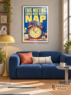 Meeting Nap (fun01) — Gold frame, white paper border and FREMAT branding in a styled interior. A sleeping pigeon slumps over an orange alarm clock among papers and mugs. Oversized yellow lettering on blue reads “THIS MEETING COULD HAVE BEEN A NAP,” with a distressed retro print texture.