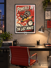 Last Minute Power (fun06) — Black frame, white paper border and FREMAT branding in a styled interior. A wide-eyed raccoon rides a rocket-powered pencil beside an alarm clock and flying papers. Angled cream lettering reads “POWERED BY THE LAST MINUTE” across a red and charcoal comic-style print.