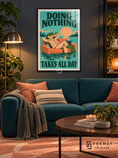 Doing Nothing (fun07) — Black frame, white paper border and FREMAT branding in a styled interior. A sunglasses-wearing crocodile in striped pajamas lounges on a floating orange sofa. “DOING NOTHING TAKES ALL DAY” appears in dark green lettering over turquoise water and a peach sun.