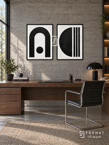 Arc Balance — set of two black-and-white artworks in Black frames.