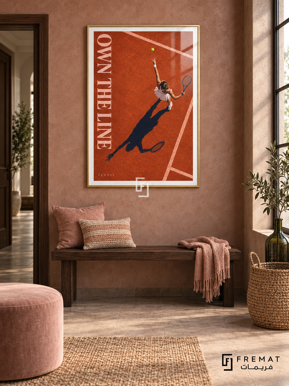 Own The Line: An overhead tennis serve casts a long navy shadow across a burnt-orange court with crisp cream lines. Gold frame with a white printed border, displayed in a styled room.