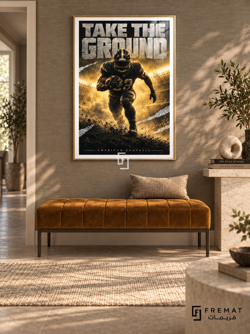 Take The Ground: A helmeted American football player carries the ball through golden haze above a charcoal foreground. Gold frame with a white printed border, displayed in a styled room.