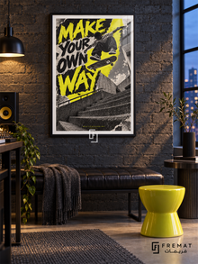 Make Your Own Way: A skateboarder jumps above concrete steps against acid-yellow and graphite graphics with a rough printed texture. Black frame with a white printed border, displayed in a styled room.