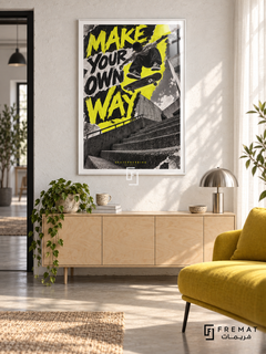 Make Your Own Way: A skateboarder jumps above concrete steps against acid-yellow and graphite graphics with a rough printed texture. White frame with a white printed border, displayed in a styled room.