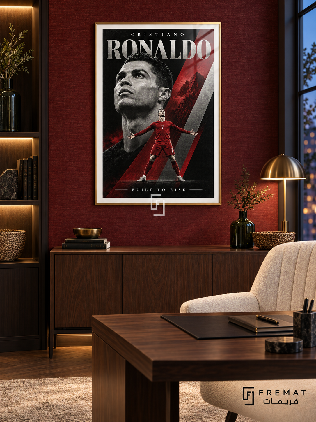 Cristiano Ronaldo: Cristiano Ronaldo appears in a monochrome portrait above a smaller red number-7 figure with outstretched arms, amid crimson and silver diagonals. Gold frame with a white printed border, displayed in a styled room.