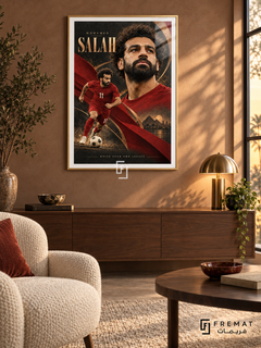 Mohamed Salah: Mohamed Salah appears in a warm portrait beside a smaller red number-11 football figure, with copper arcs and charcoal-and-gold textures. Gold frame with a white printed border, displayed in a styled room.