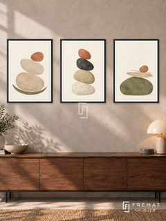 Balanced Stones — set of three complementary boho artworks in Black frames, shown at 50×70 cm each.