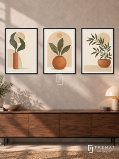 Terracotta Garden — set of three complementary boho artworks in Black frames, shown at 50×70 cm each.