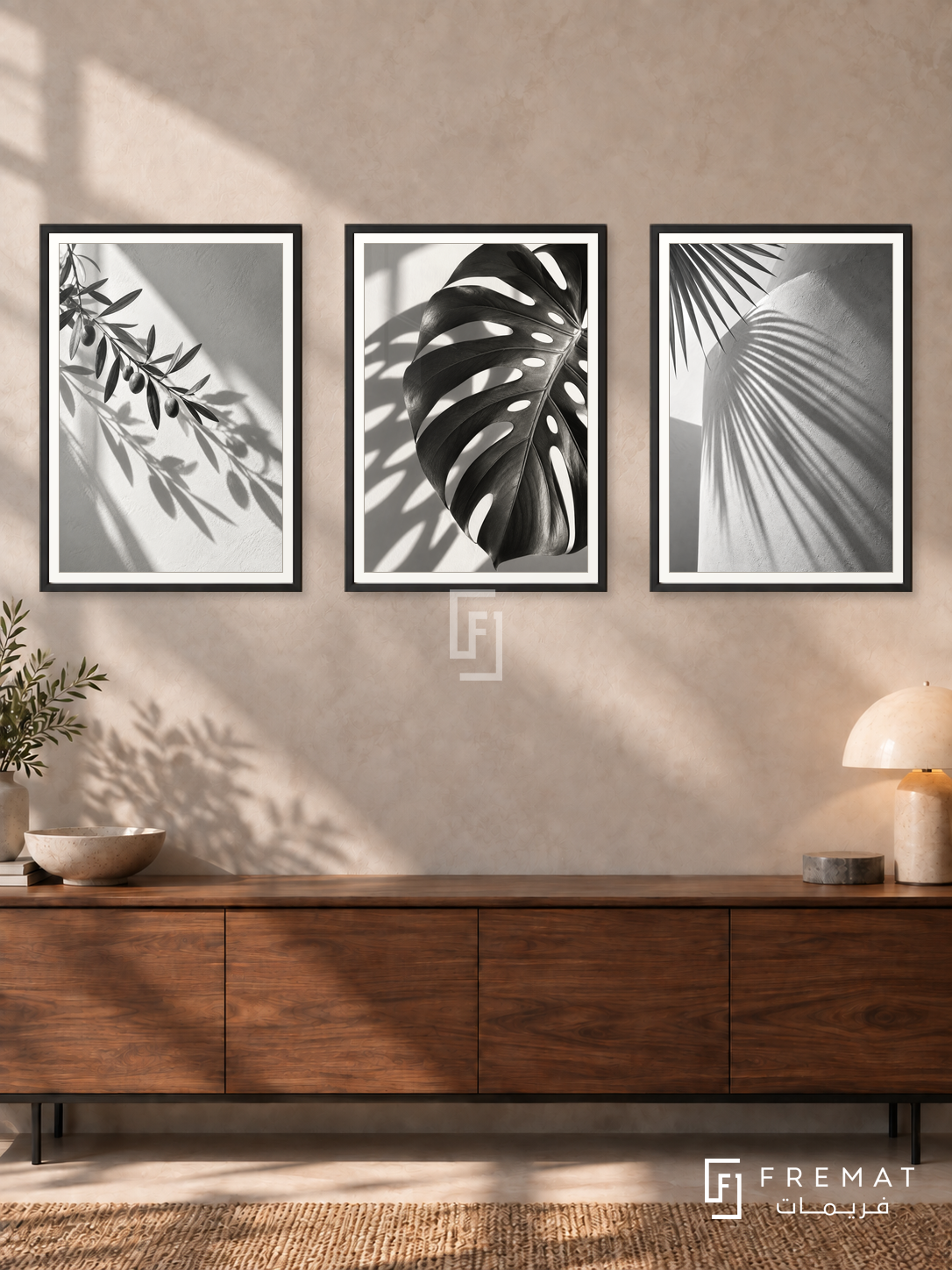 Botanical Shadows — set of three complementary black and white artworks in Black frames, shown at 50×70 cm each.