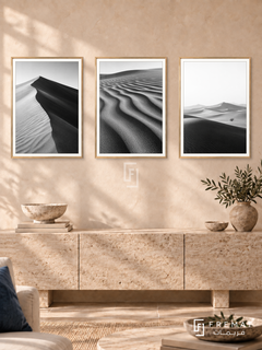 Desert Lines — set of three complementary black and white artworks in Gold frames, shown at 50×70 cm each.