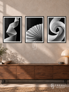 Paper Poetry — set of three complementary black and white artworks in Black frames, shown at 50×70 cm each.