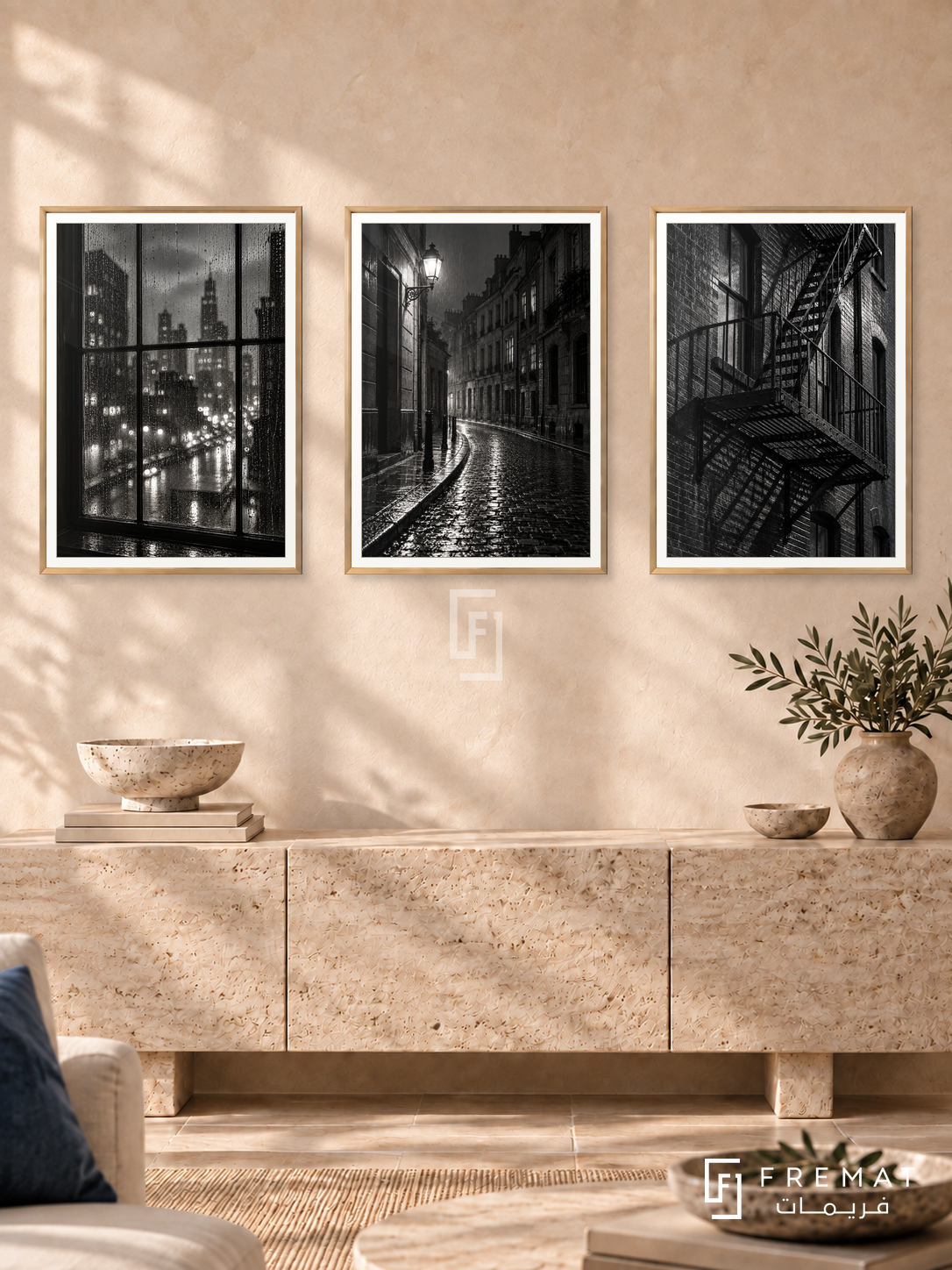 Urban Rain — set of three complementary black and white artworks in Gold frames, shown at 50×70 cm each.