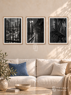 Urban Rain — set of three complementary black and white artworks in Wooden Texture frames, shown at 50×70 cm each.