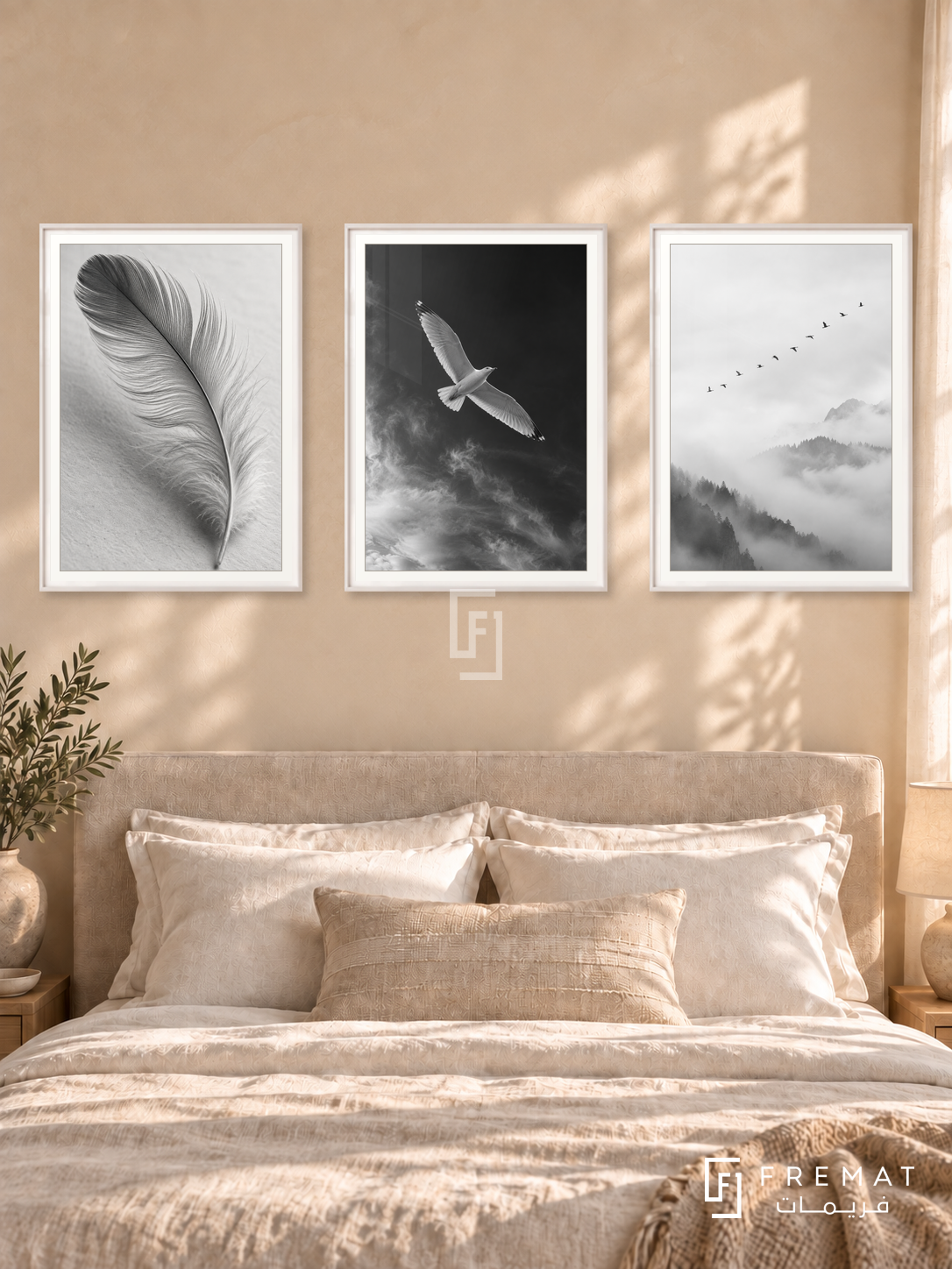Feather And Flight — set of three complementary black and white artworks in White frames, shown at 50×70 cm each.