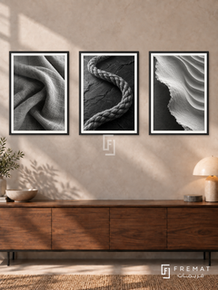 Woven Earth — set of three complementary black and white artworks in Black frames, shown at 50×70 cm each.