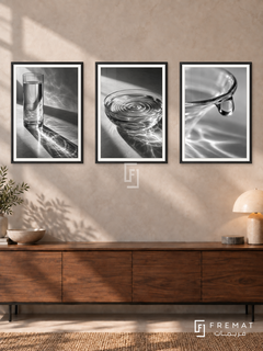 Glass And Water — set of three complementary black and white artworks in Black frames, shown at 50×70 cm each.