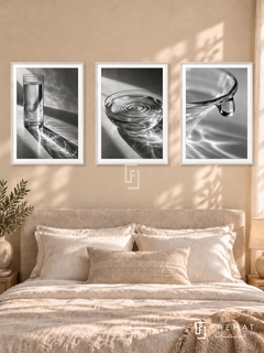 Glass And Water — set of three complementary black and white artworks in White frames, shown at 50×70 cm each.
