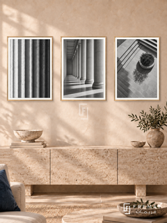 Rhythm Of Columns — set of three complementary black and white artworks in Gold frames, shown at 50×70 cm each.