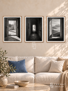 Thresholds — set of three complementary black and white artworks in Wooden Texture frames, shown at 50×70 cm each.