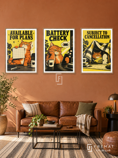 Battery — set of three complementary funny artworks in Wooden Texture frames, shown at 50×70 cm each.