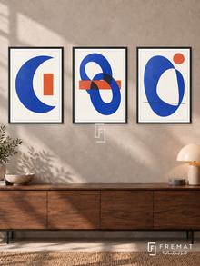 Cobalt Conversation — set of three complementary modern abstract artworks in Black frames, shown at 50×70 cm each.