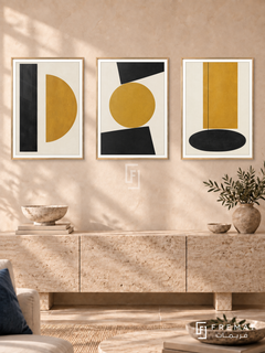 Ochre Equilibrium — set of three complementary modern abstract artworks in Gold frames, shown at 50×70 cm each.