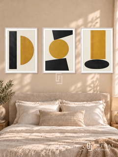 Ochre Equilibrium — set of three complementary modern abstract artworks in White frames, shown at 50×70 cm each.