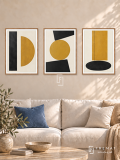 Ochre Equilibrium — set of three complementary modern abstract artworks in Wooden Texture frames, shown at 50×70 cm each.