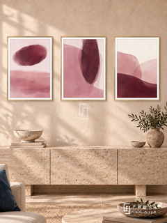 Blush And Burgundy — set of three complementary modern abstract artworks in Gold frames, shown at 50×70 cm each.