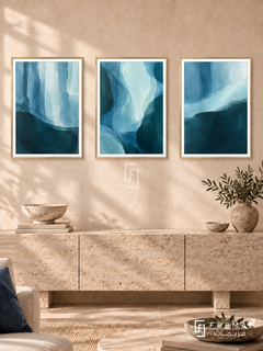 Tidal Depth — set of three complementary modern abstract artworks in Gold frames, shown at 50×70 cm each.