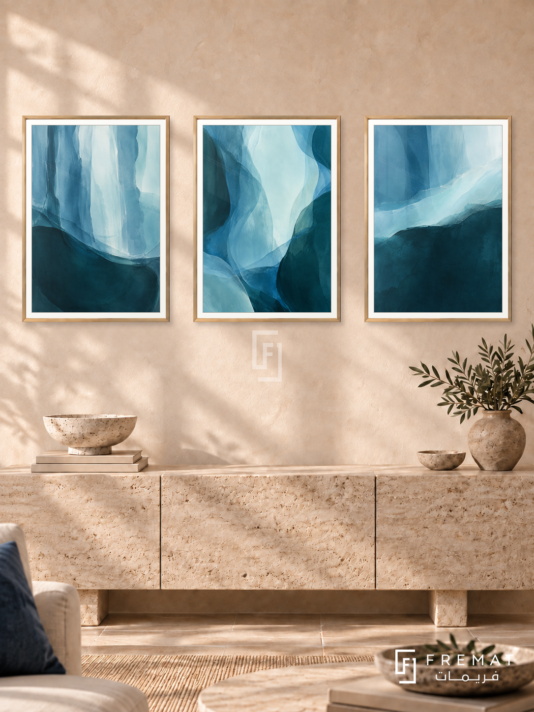 Tidal Depth — set of three complementary modern abstract artworks in Gold frames, shown at 50×70 cm each.