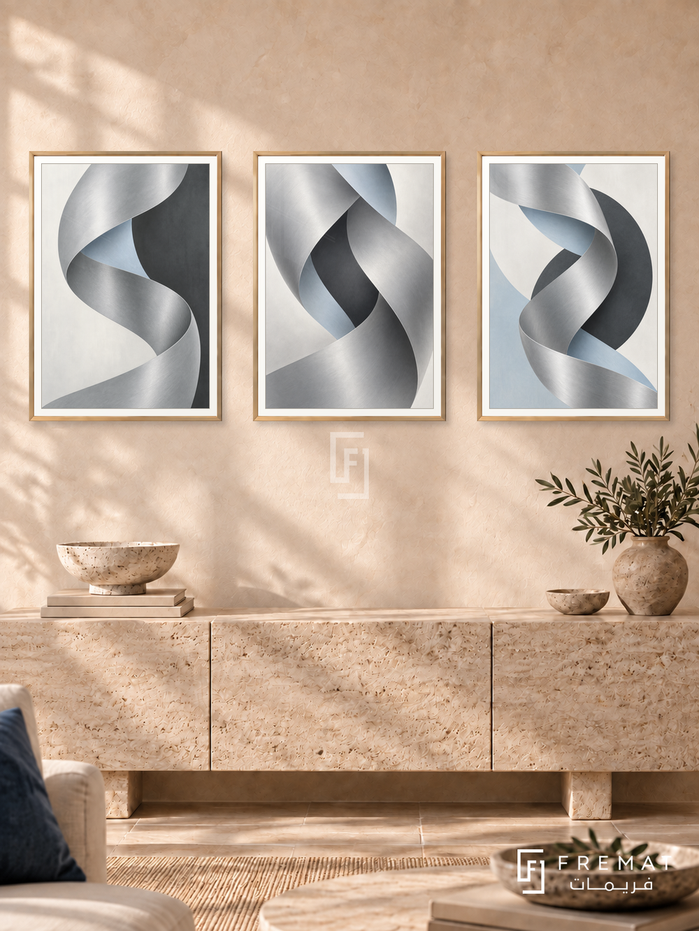 Quiet Chrome — set of three complementary modern abstract artworks in Gold frames, shown at 50×70 cm each.