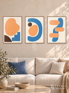 Apricot Play — set of three complementary modern abstract artworks in Wooden Texture frames, shown at 50×70 cm each.